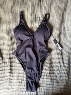 TA3 Hi Cut Plungey black lace up one piece